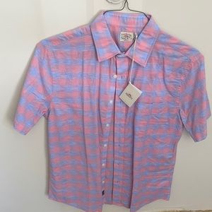 Men’s button up t-shirt.